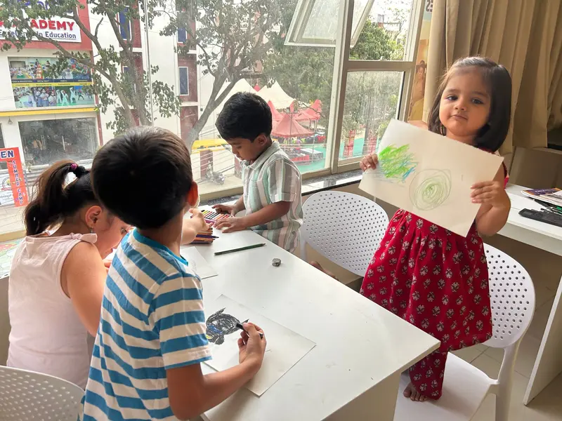 Drawing together at the art table